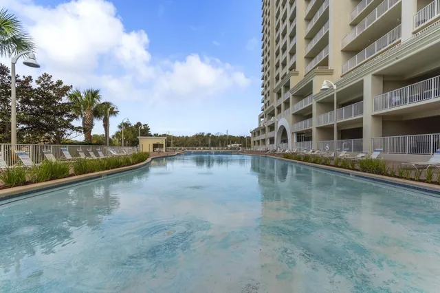 a view of a lake with building in front of it