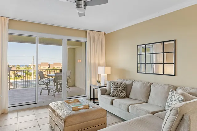 a living room with furniture and a table