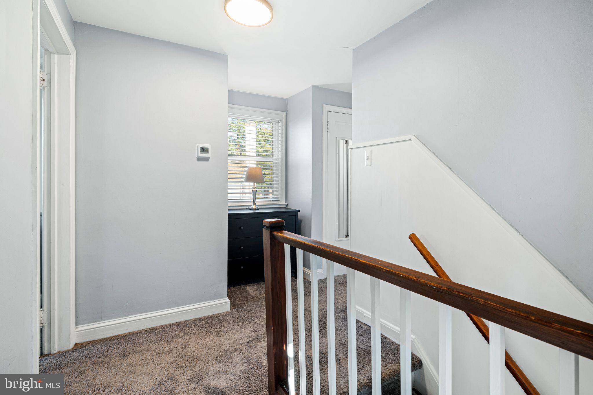 273 Hopkins Road Haddonfield, NJ 08033 - Photo 18 of 35 a view of a hallway with windows