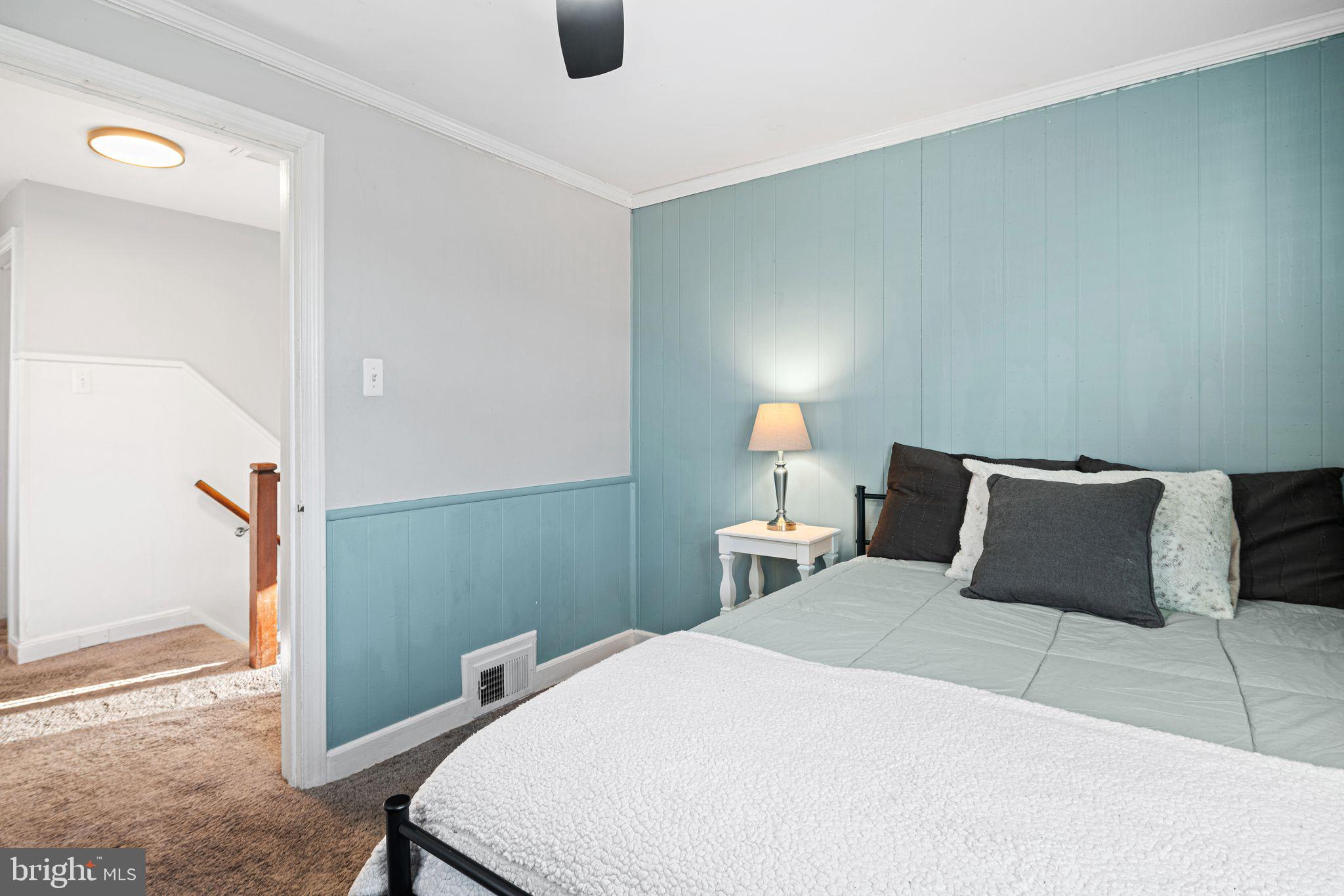273 Hopkins Road Haddonfield, NJ 08033 - Photo 25 of 35 a bedroom with a bed and wooden floor