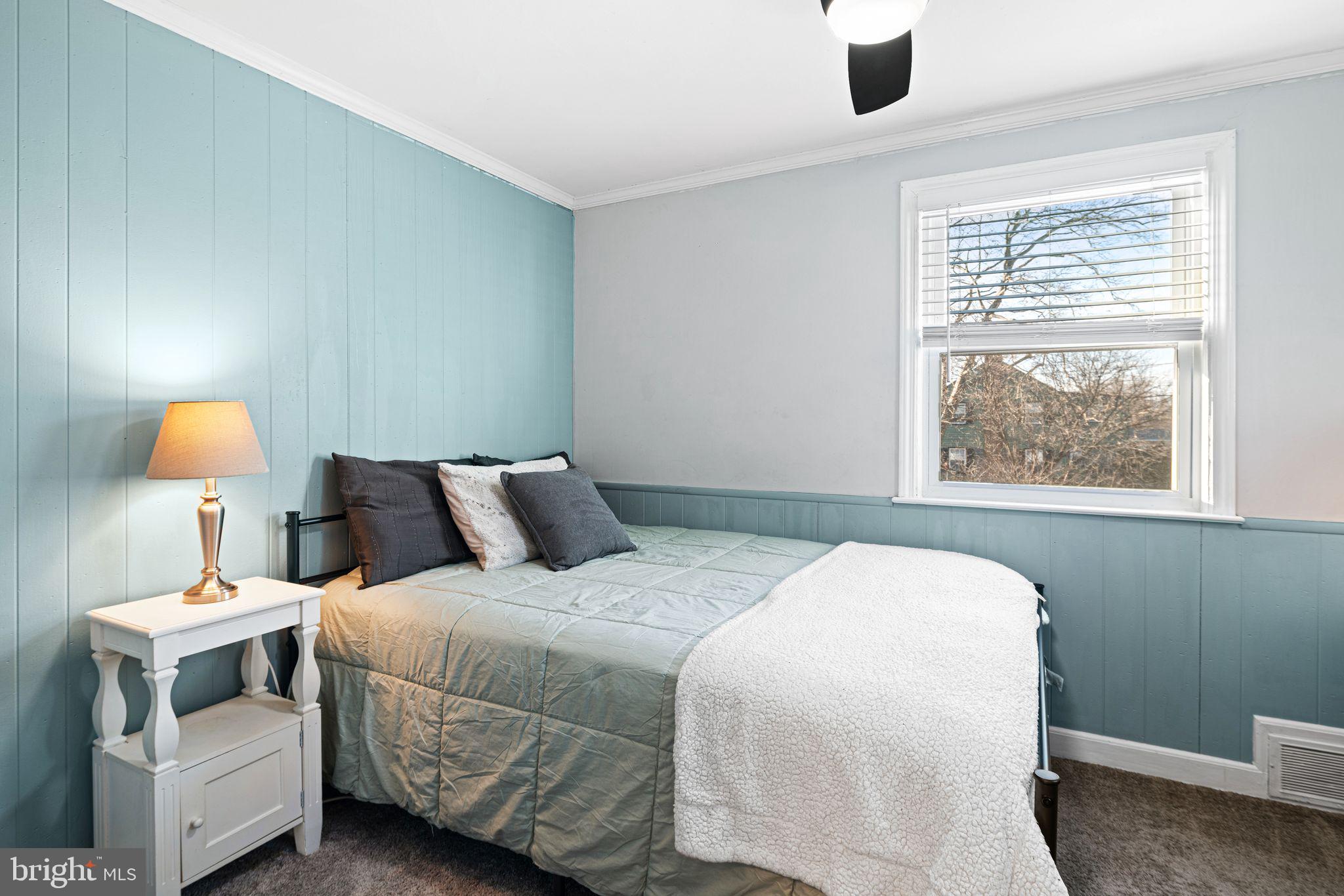 273 Hopkins Road Haddonfield, NJ 08033 - Photo 26 of 35 a bedroom with a bed and a window