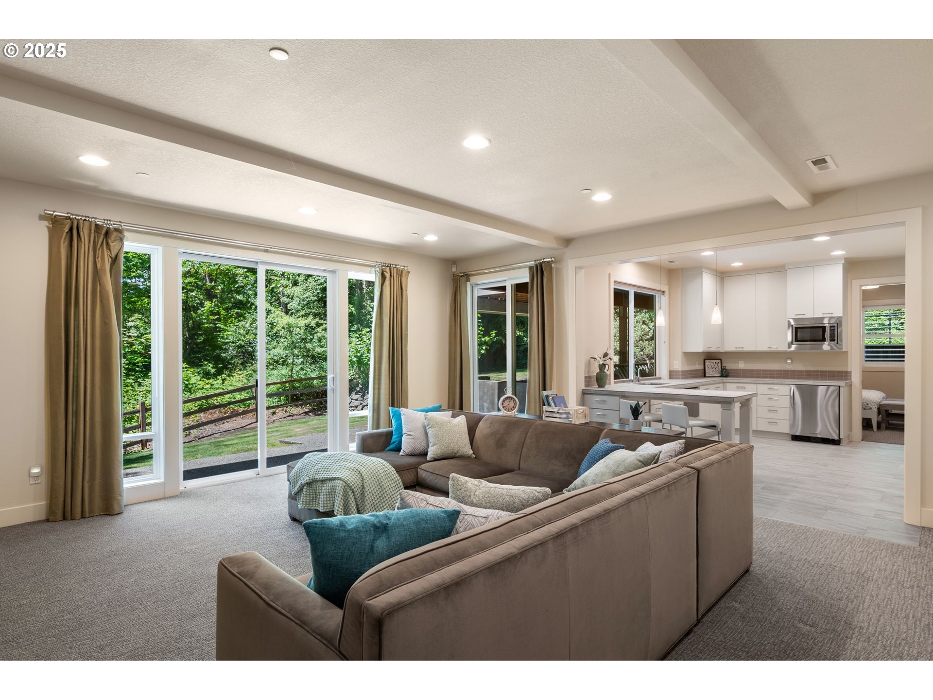 3425 Southwest 57th Avenue Portland, OR 97221 - Photo 13 of 33 a living room with furniture and a large window