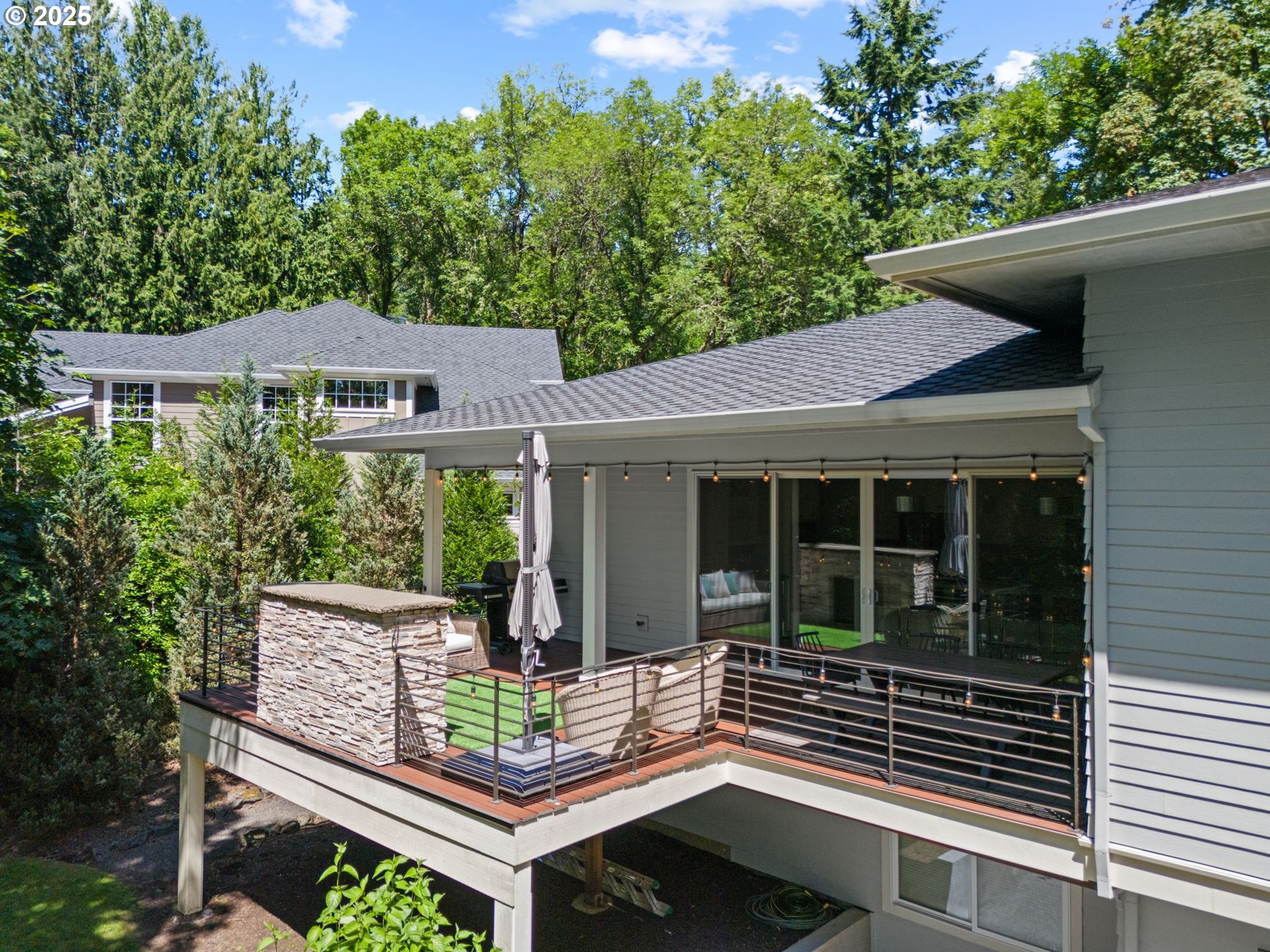 3425 Southwest 57th Avenue Portland, OR 97221 - Photo 15 of 33 a view of house with backyard outdoor seating and green space