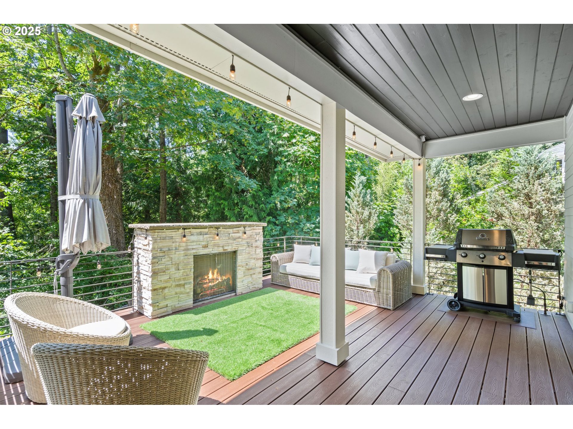 3425 Southwest 57th Avenue Portland, OR 97221 - Photo 19 of 33 a backyard of a house with wooden floor a yard and outdoor seating