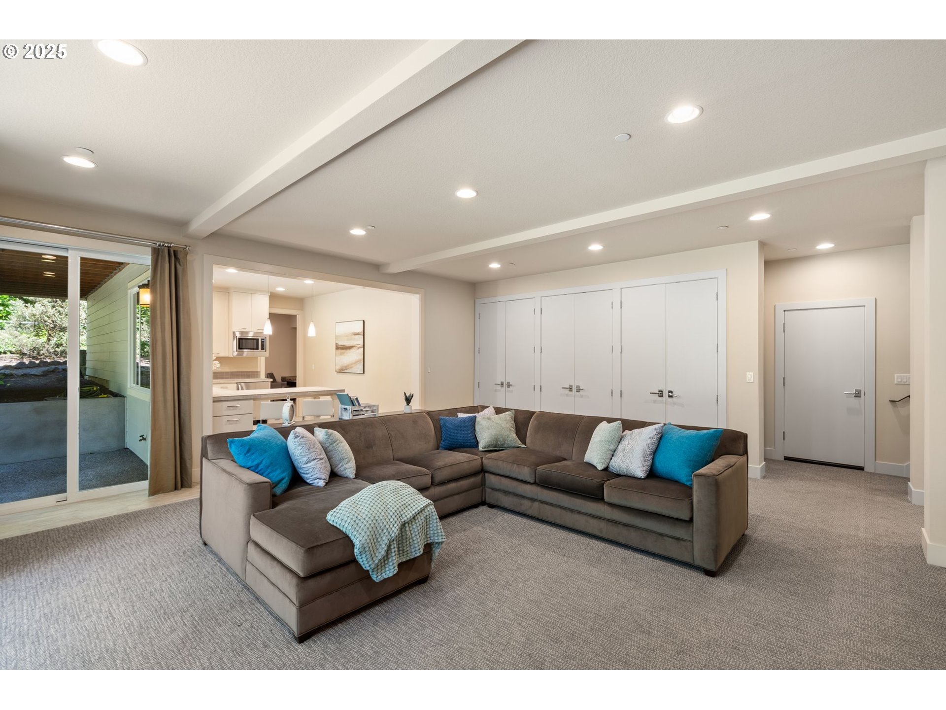 3425 Southwest 57th Avenue Portland, OR 97221 - Photo 21 of 33 a living room with furniture and a large window