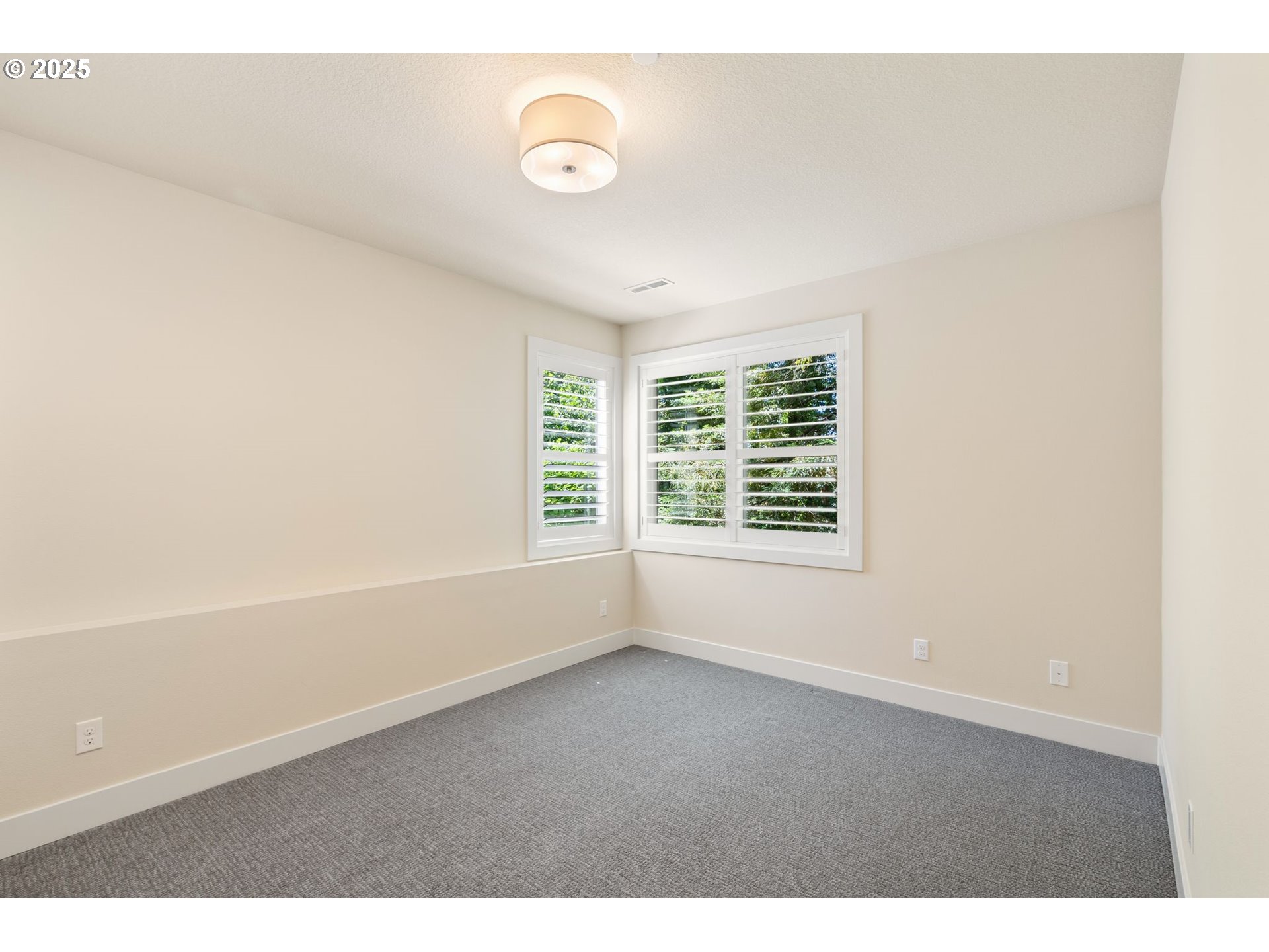 3425 Southwest 57th Avenue Portland, OR 97221 - Photo 27 of 33 a view of an empty room with a window