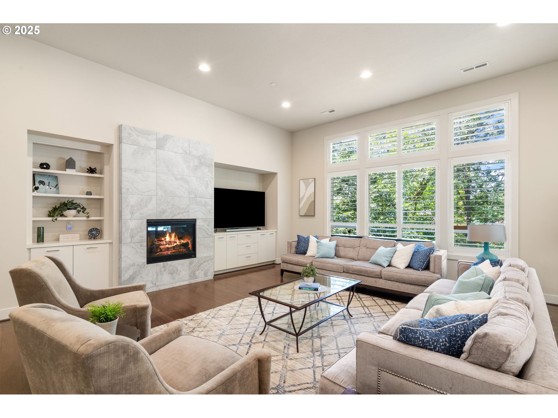 3425 Southwest 57th Avenue Portland, OR 97221 - Photo 3 of 33 a living room with furniture and a flat screen tv