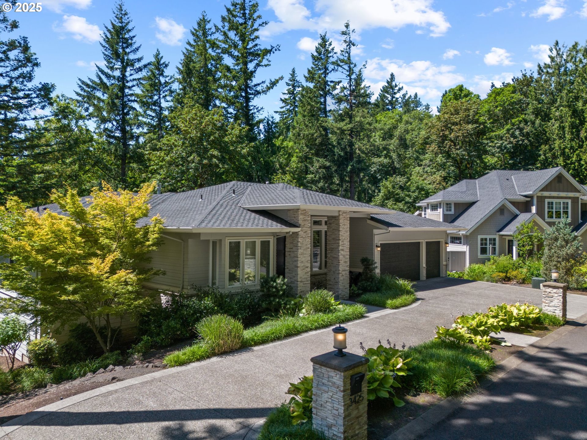 3425 Southwest 57th Avenue Portland, OR 97221 - Photo 31 of 33 a front view of a house with a yard and outdoor seating
