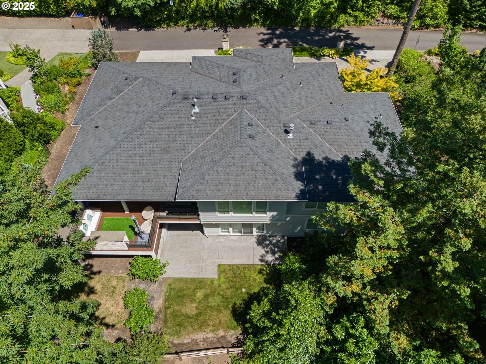 3425 Southwest 57th Avenue Portland, OR 97221 - Photo 32 of 33 an aerial view of a house with a yard basket ball court and outdoor seating