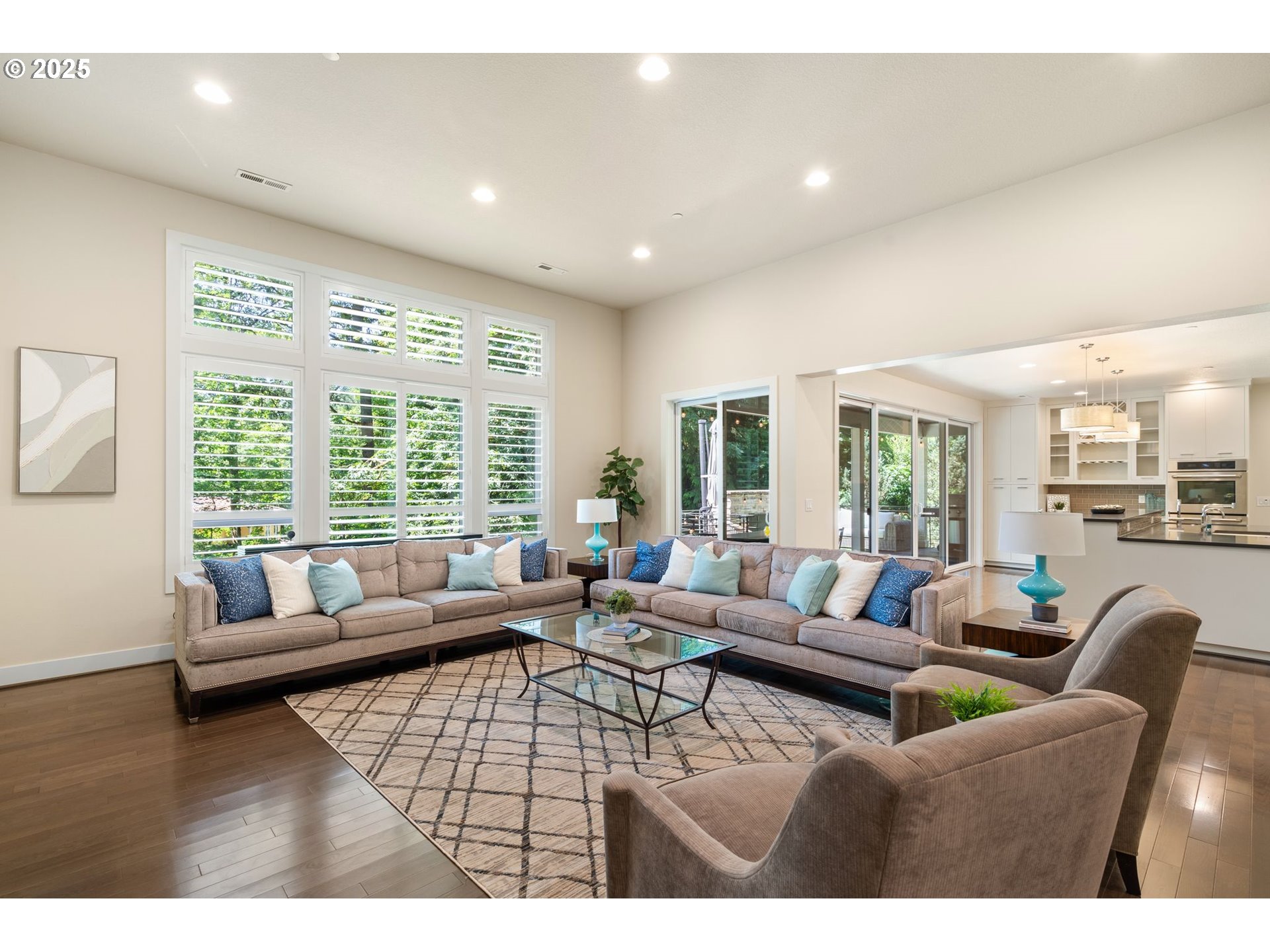 3425 Southwest 57th Avenue Portland, OR 97221 - Photo 4 of 33 a living room with furniture and floor to ceiling windows