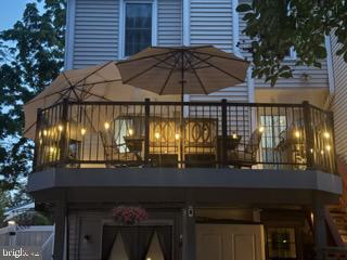 632 Concerto Lane Silver Spring, MD 20901 - Photo 2 of 5 Charming deck with cozy evening lights.
