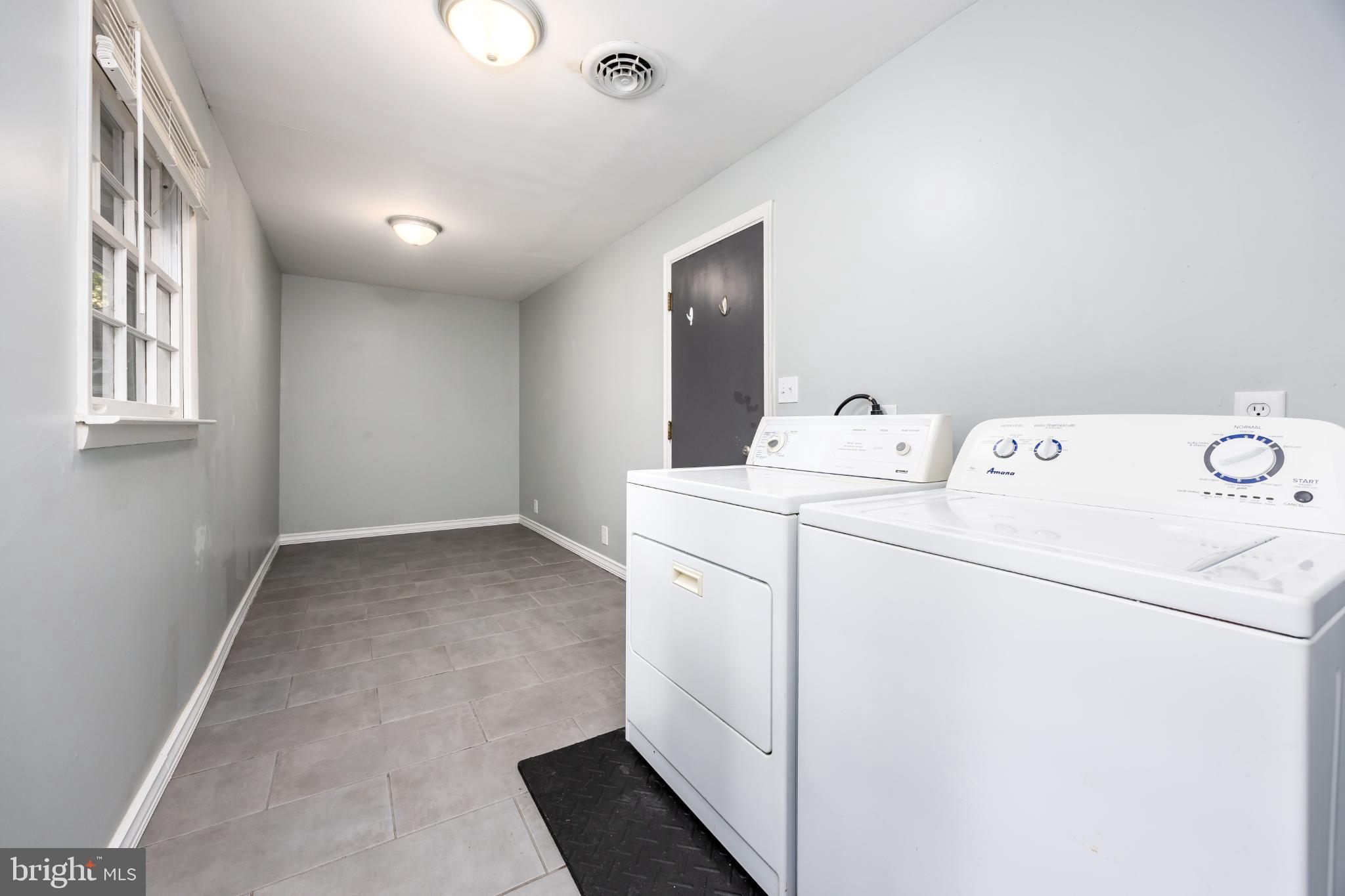 1105 Middleneck Drive Salisbury, MD 21804 - Photo 25 of 38 a utility room with dryer and washer