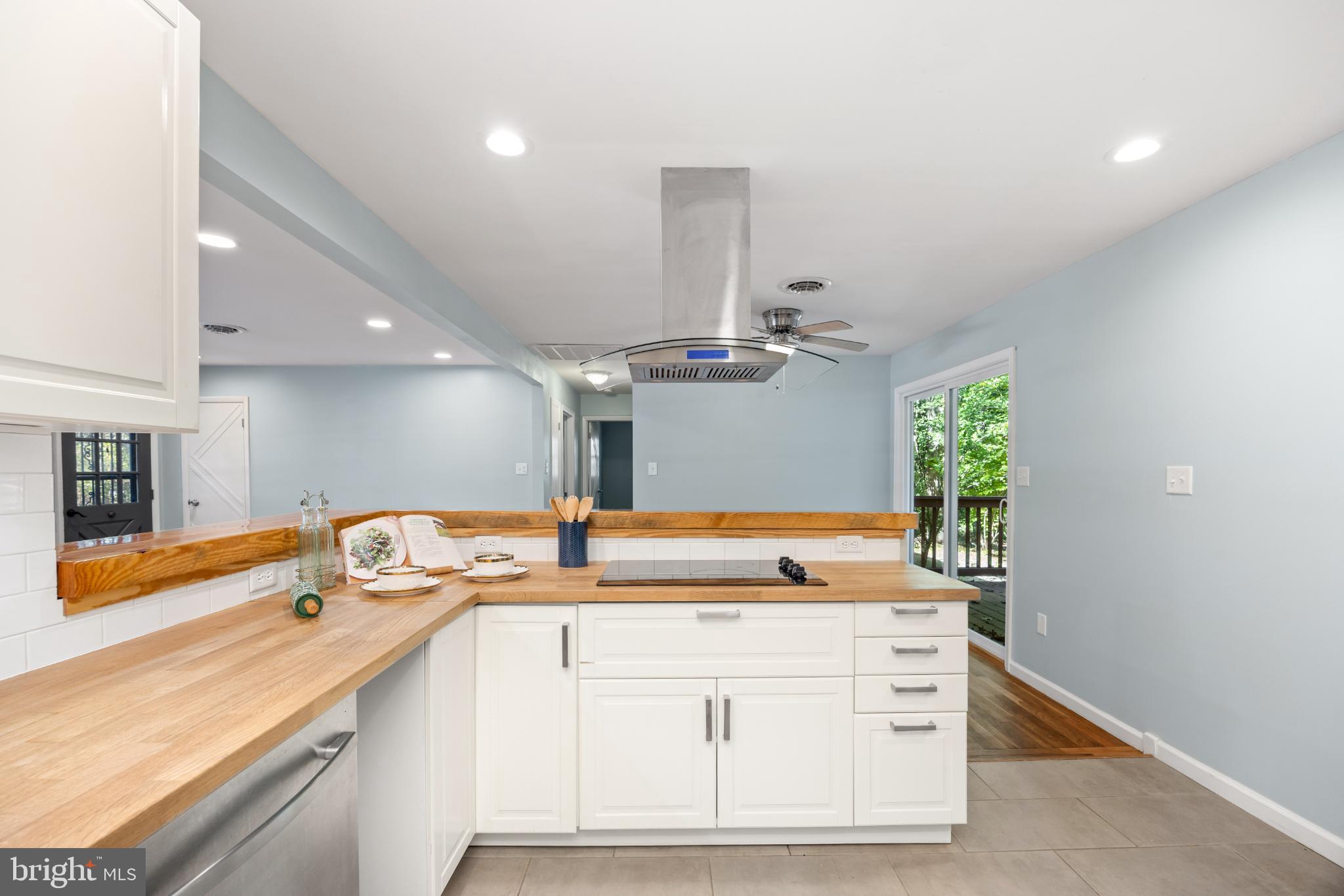 1105 Middleneck Drive Salisbury, MD 21804 - Photo 3 of 38 a kitchen with granite countertop a sink and a stove