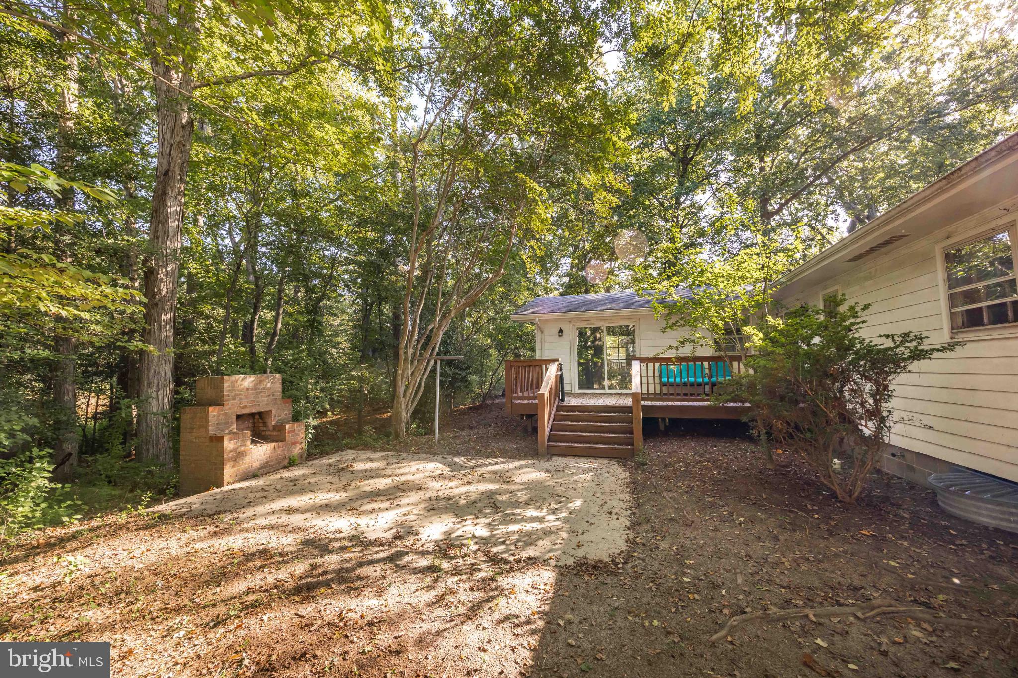 1105 Middleneck Drive Salisbury, MD 21804 - Photo 32 of 38 a wooden bench sitting in front of a building