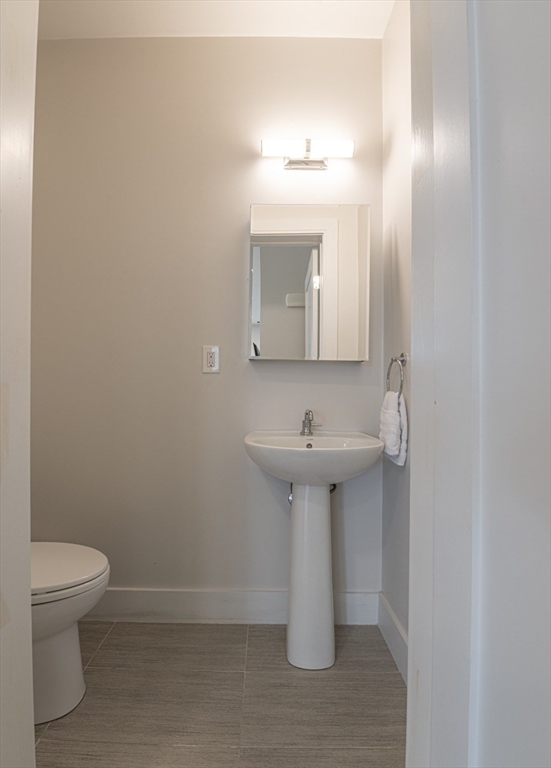 24 Rush Street, Unit I Somerville, MA 02145 - Photo 11 of 21 a bathroom with a sink toilet