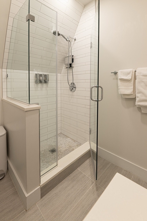 24 Rush Street, Unit I Somerville, MA 02145 - Photo 17 of 21 a bathroom with a shower