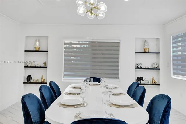 a bedroom with a bed and a ceiling fan