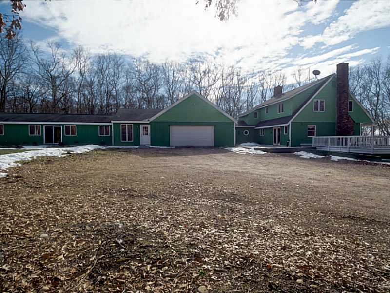 Exterior Front. Custom-built colonial in a private setting