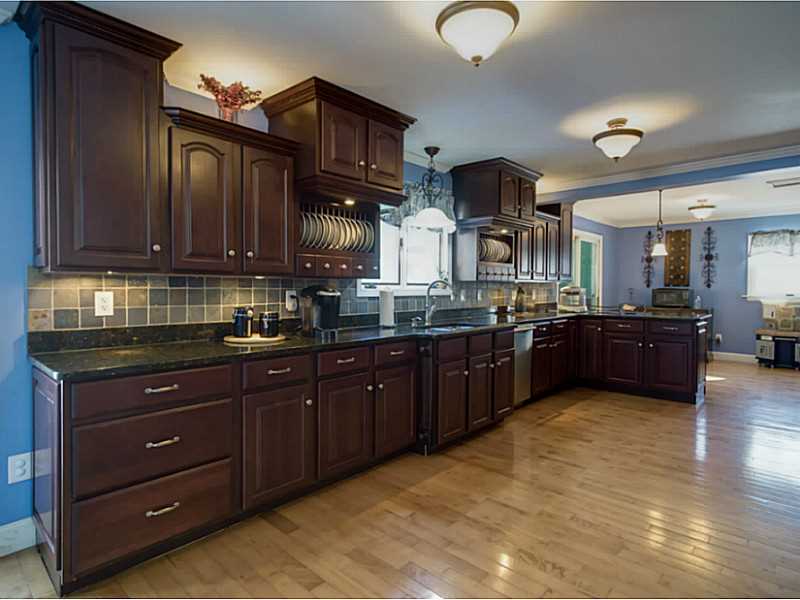 48 Maxson Hill Road Hopkinton, RI 02804 - Photo 3 of 18 Kitchen. Custom Cabinets with granite and stainless steel appliances.