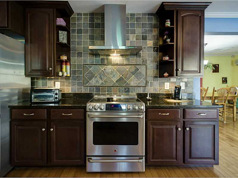48 Maxson Hill Road Hopkinton, RI 02804 - Photo 4 of 18 Kitchen. Custom tile work throughout