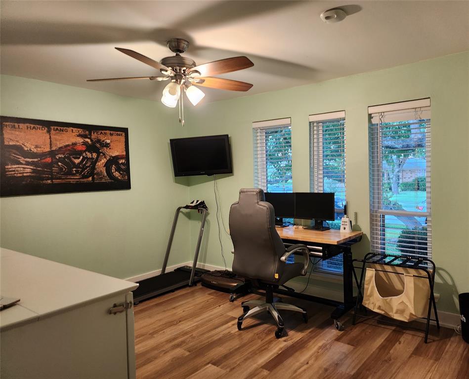 1023 Ridgefield Drive Plano, TX 75075 - Photo 21 of 39 a view of a workspace with furniture and a window
