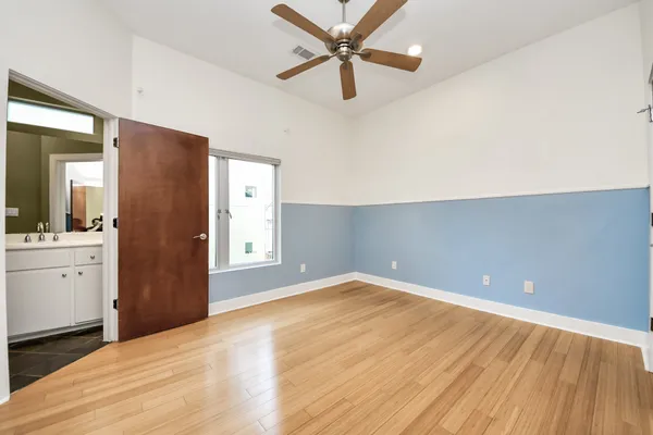 a view of a kitchen with a dishwasher cabinet and a refrigerator