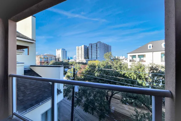 a view of a balcony with an outdoor space