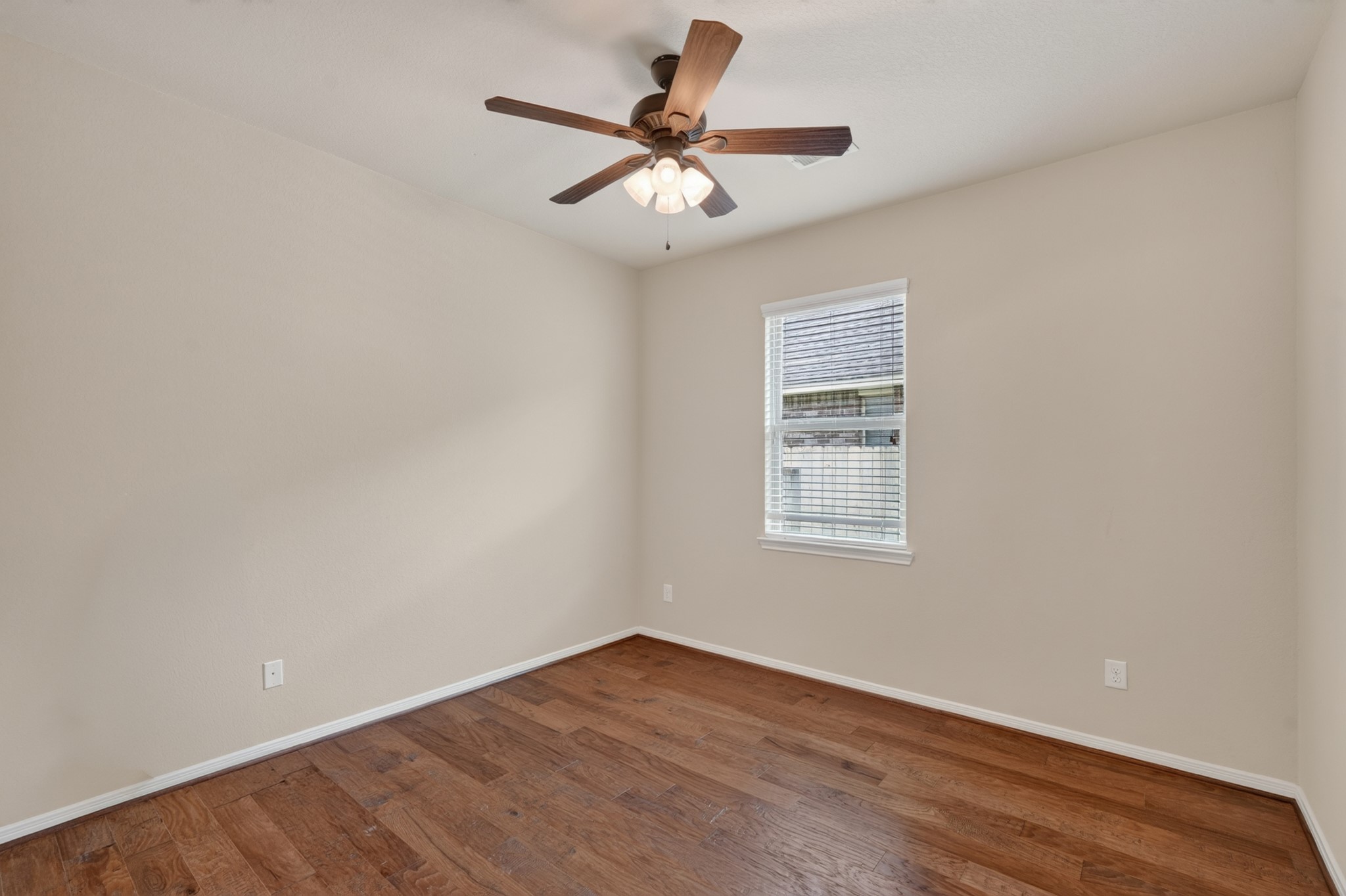 5414 Claymore Meadow Lane Spring, TX 77389 - Photo 26 of 35 Secondary Bedroom with Wood Floors.