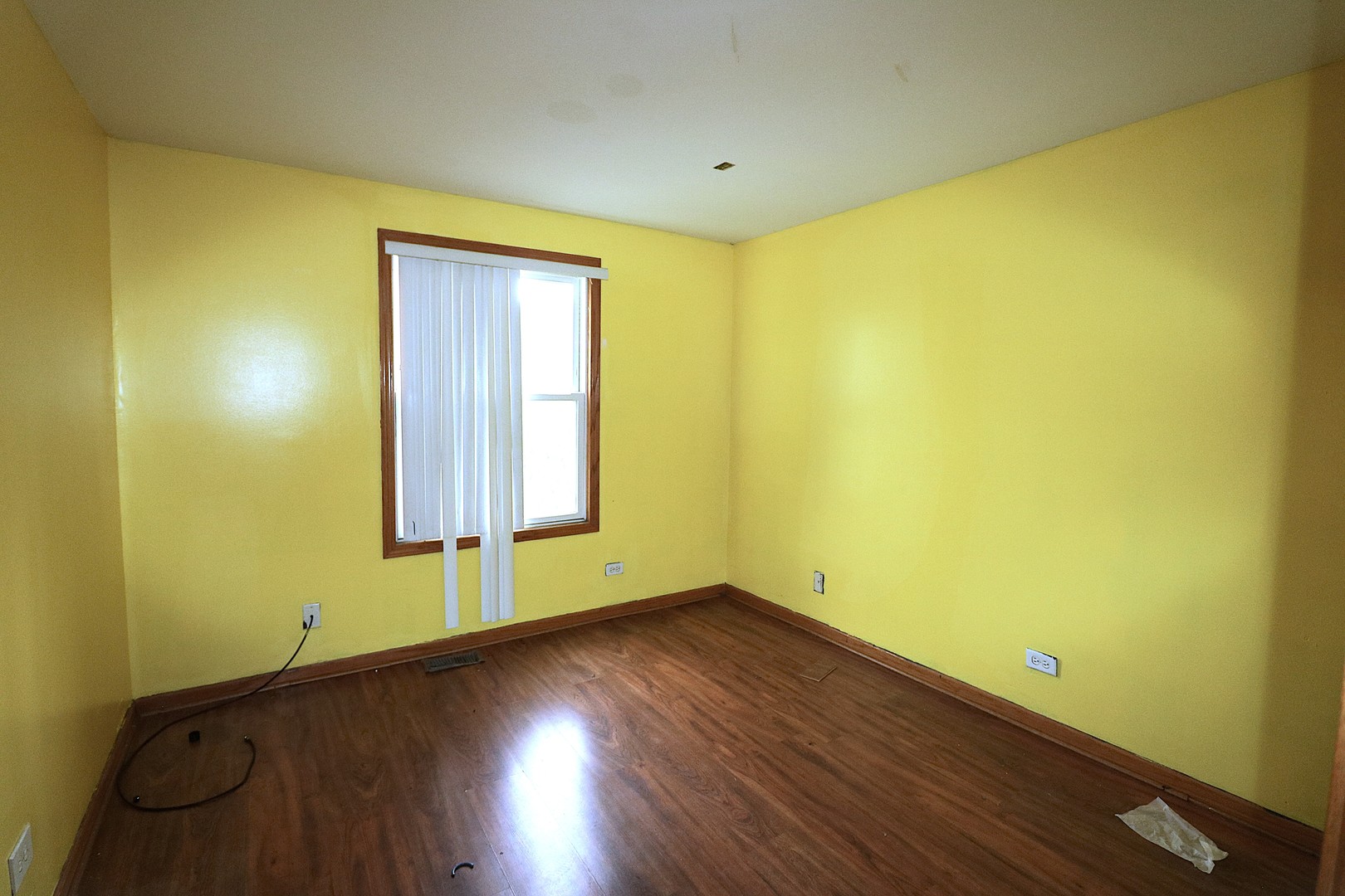 319 Dean Circle Bolingbrook, IL 60440 - Photo 4 of 11 a view of a room with wooden floor and windows