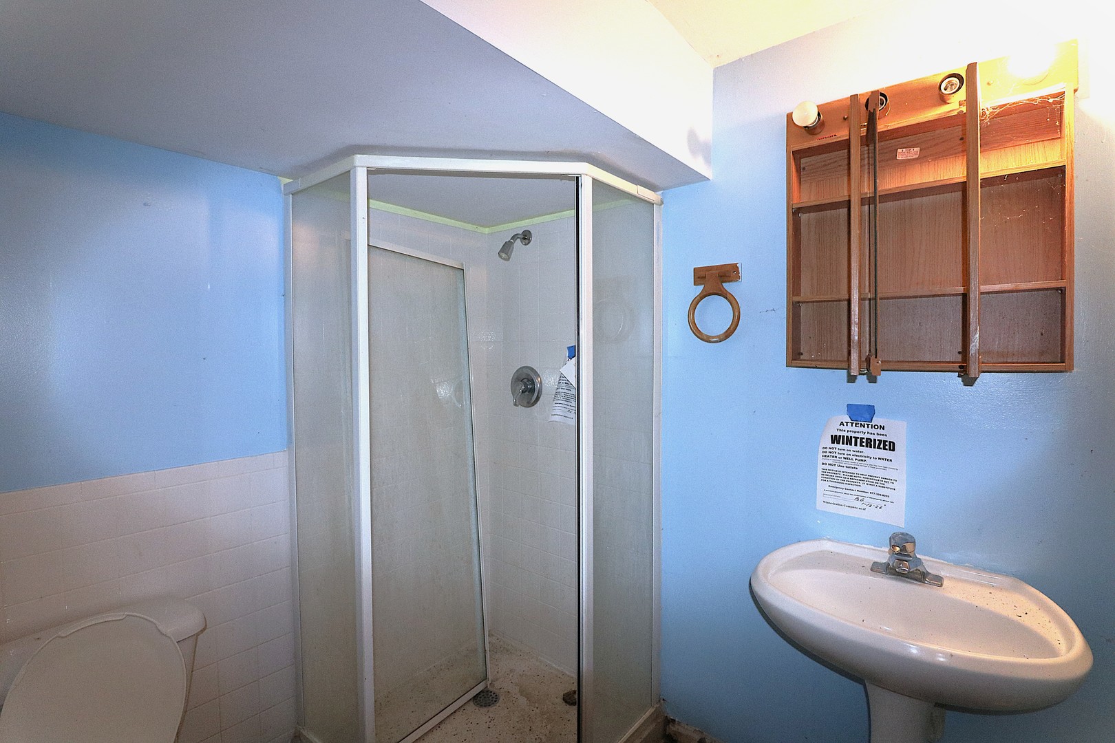 319 Dean Circle Bolingbrook, IL 60440 - Photo 8 of 11 a bathroom with a sink and mirror