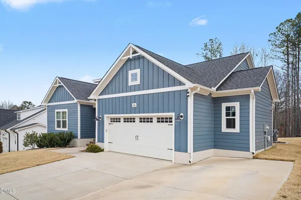 a view of a house with a garage