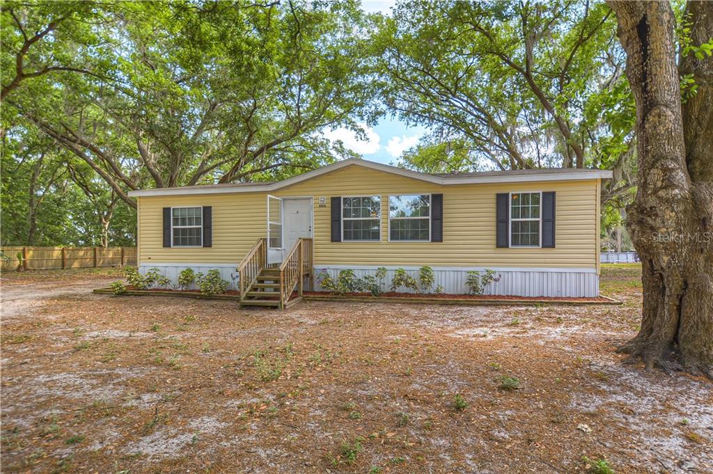 11416 Brahman Road Lithia, FL 33547 - Photo 1 of 1 Sitting on a quiet road in rural Lithia, this home is located on an oversized lot of 1-acre and zoned for agriculture!