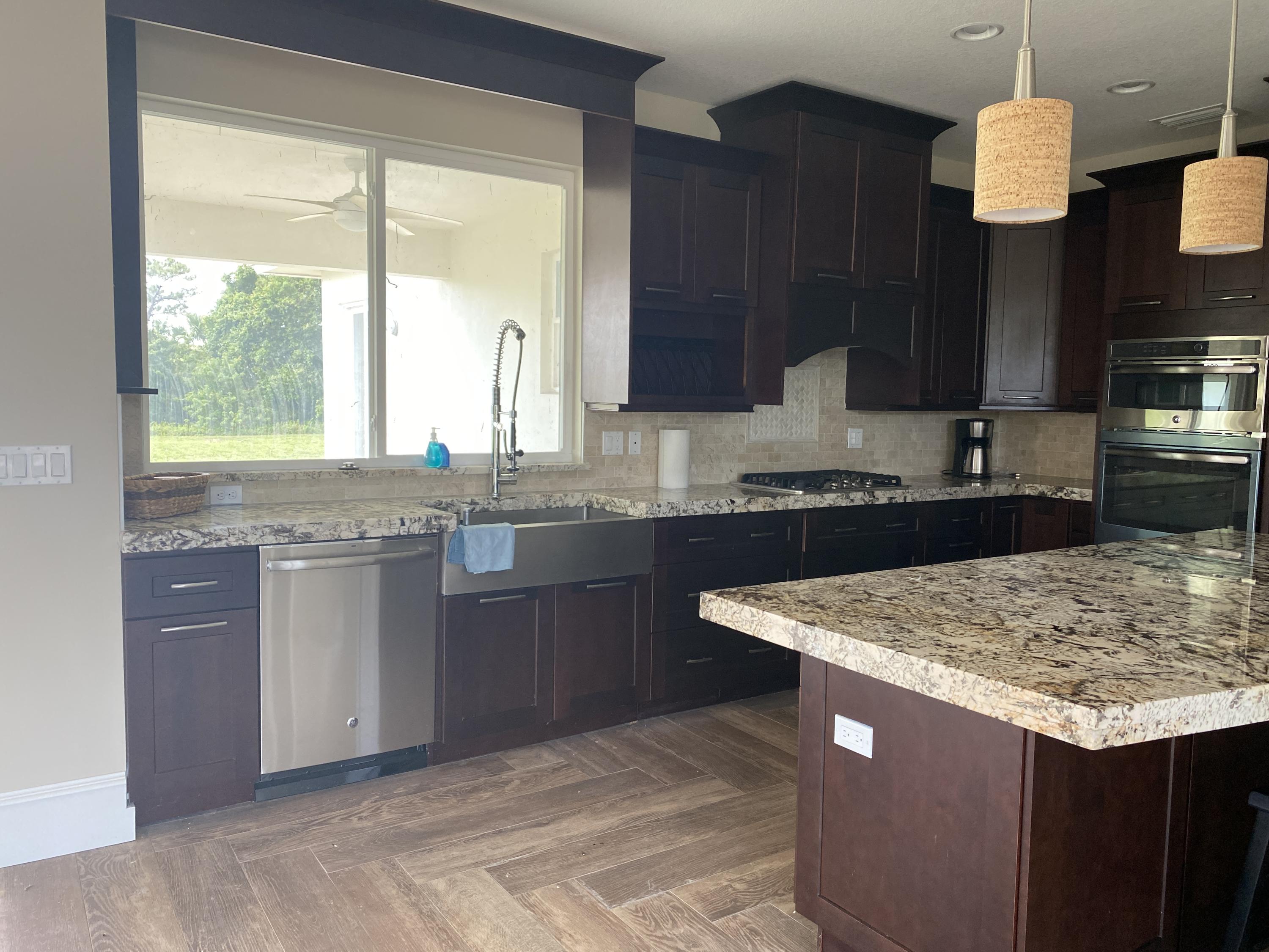 1104 Northwest Spruce Ridge Drive Stuart, FL 34994 - Photo 5 of 31 20210426_142719934_iOS