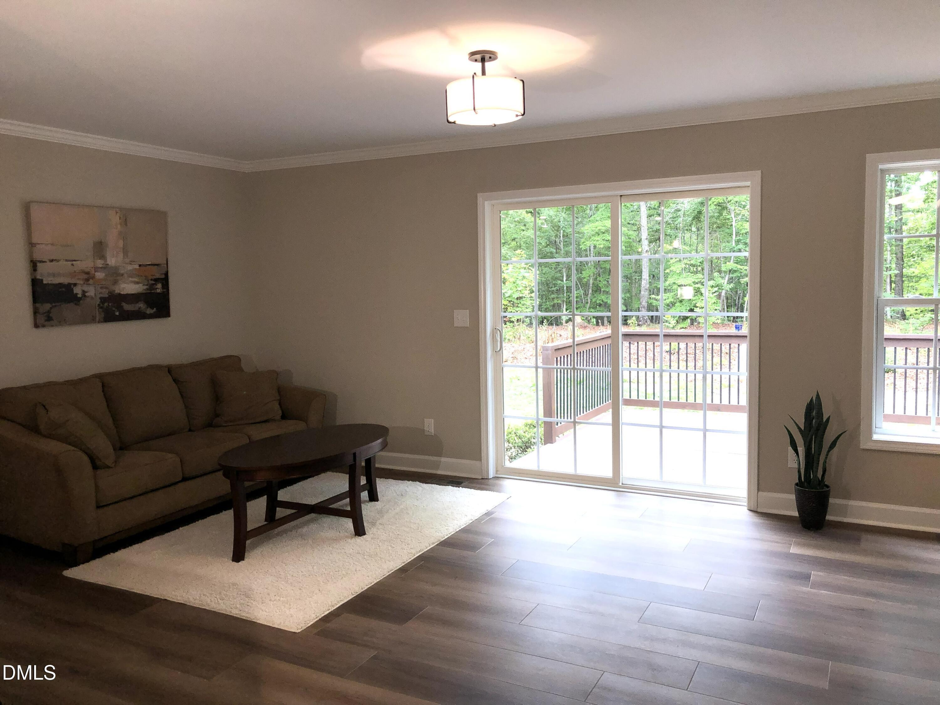 95 Smith Taylor Trail Roxboro, NC 27574 - Photo 27 of 47 a living room with furniture and a window