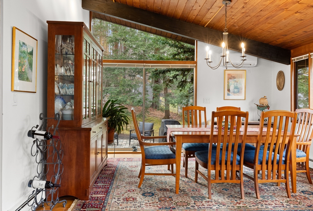 76 Hillside Road North Andover, MA 01845 - Photo 15 of 42 a view of a dining room with furniture window and outside view