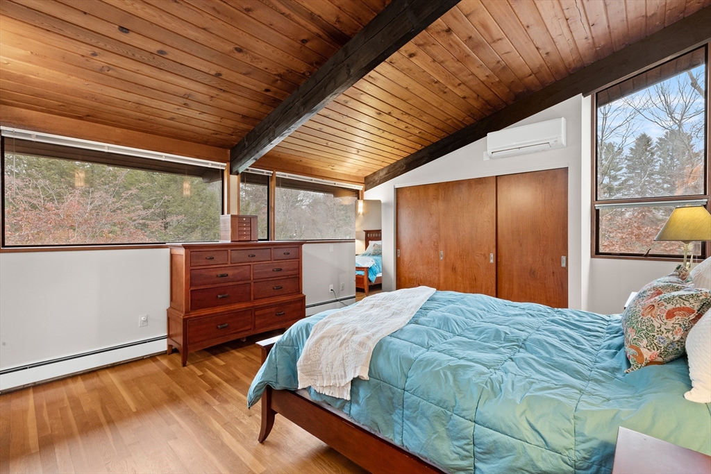 76 Hillside Road North Andover, MA 01845 - Photo 26 of 42 a bedroom with a bed and a dresser