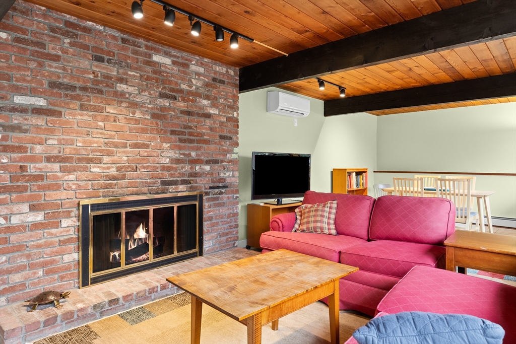 76 Hillside Road North Andover, MA 01845 - Photo 34 of 42 a outdoor living space with furniture and a fireplace