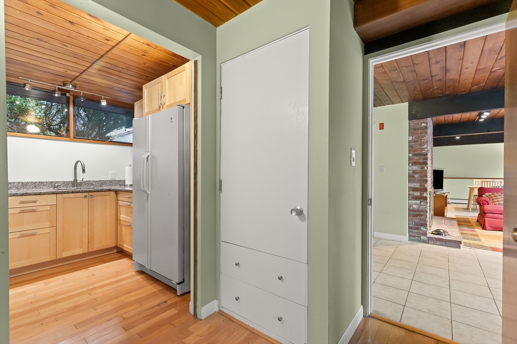 76 Hillside Road North Andover, MA 01845 - Photo 40 of 42 a view of walk in closet with clothes