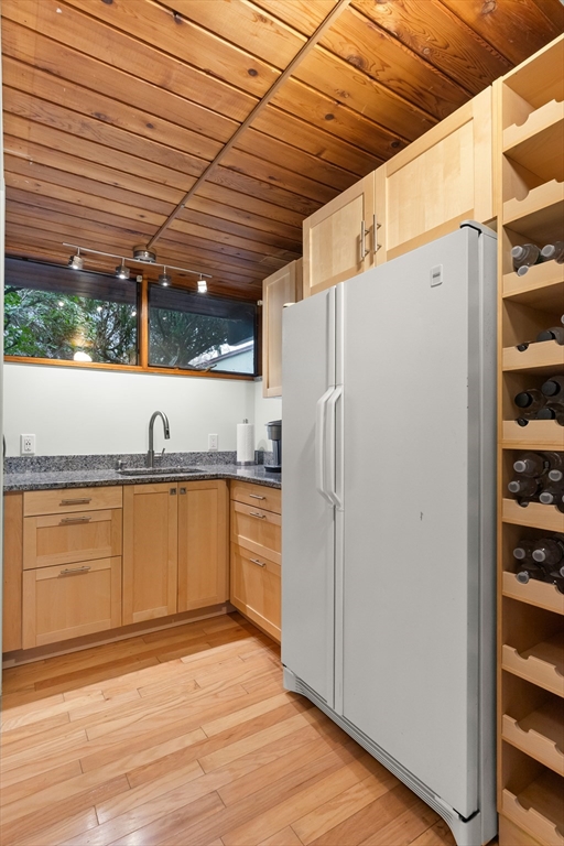 76 Hillside Road North Andover, MA 01845 - Photo 41 of 42 a view of a refrigerator in the kitchen