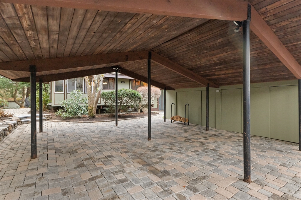 76 Hillside Road North Andover, MA 01845 - Photo 6 of 42 a view of empty room with window and wooden floor