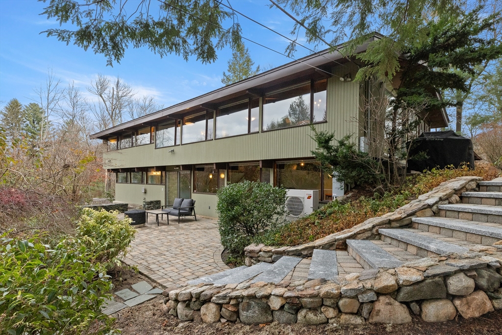 76 Hillside Road North Andover, MA 01845 - Photo 8 of 42 a front view of a house with a yard