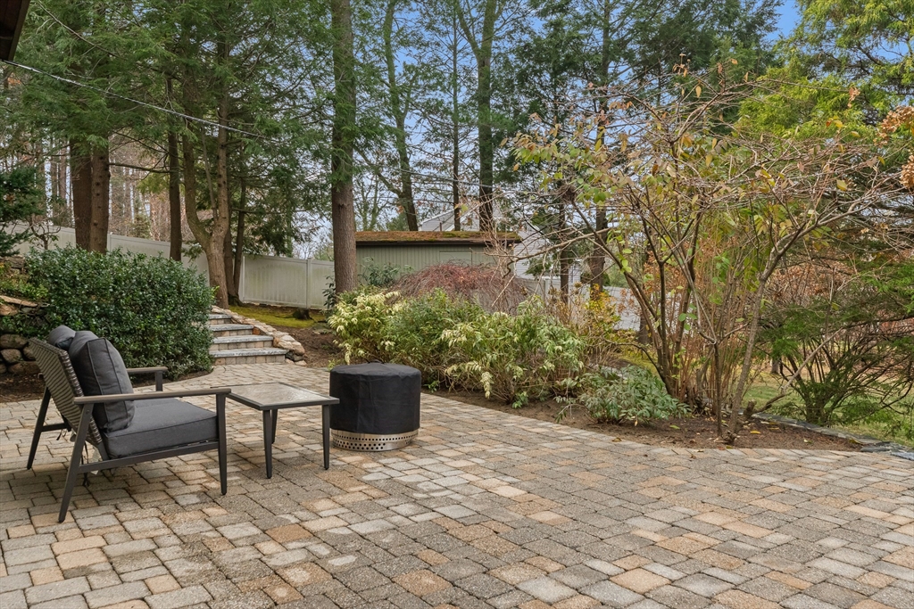 76 Hillside Road North Andover, MA 01845 - Photo 10 of 42 a backyard of a house with table and chairs