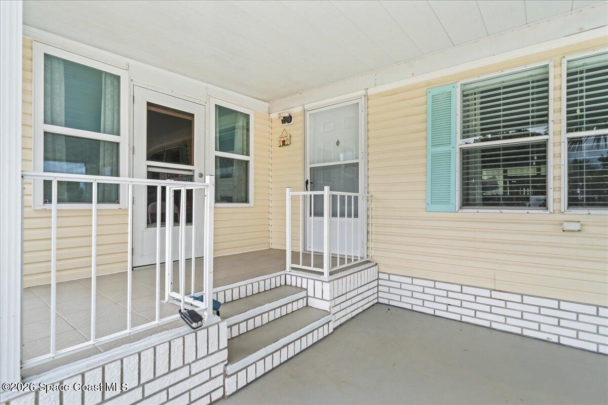 7628 Boxelder Road Micco, FL 32976 - Photo 2 of 30 Entry Carport