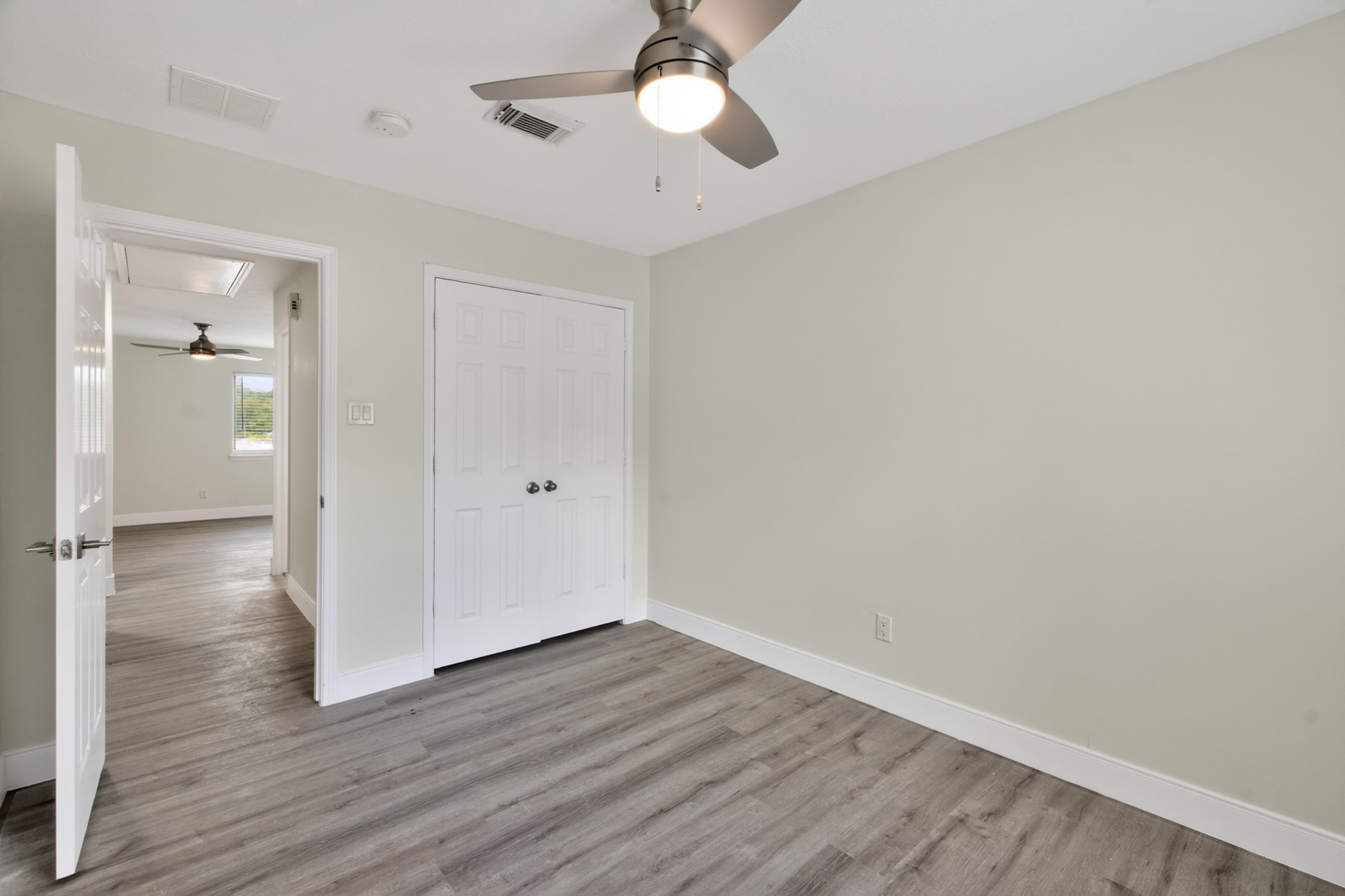 918 Ivycroft Lane Spring, TX 77373 - Photo 26 of 33 wooden floor in an empty room with a window