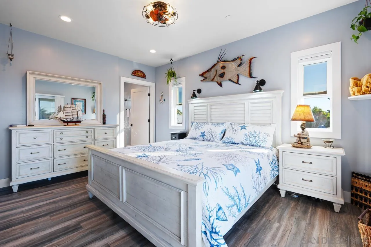 413 Delaware Street Imperial Beach, CA 91932 - Photo 25 of 37 a bedroom with a bed and a dresser