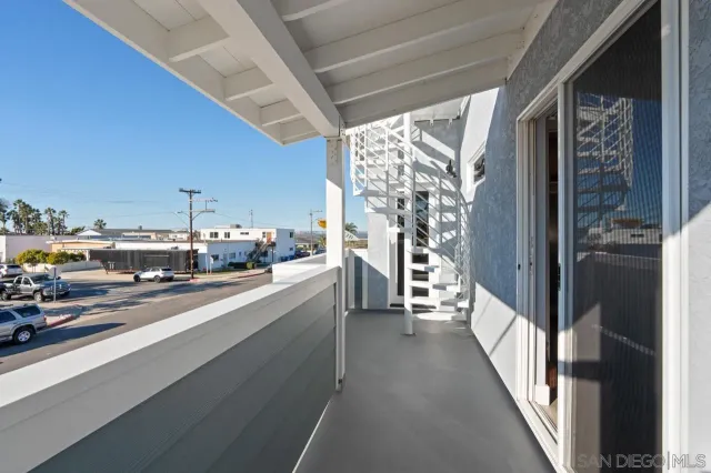 a kitchen with stainless steel appliances a refrigerator and a window