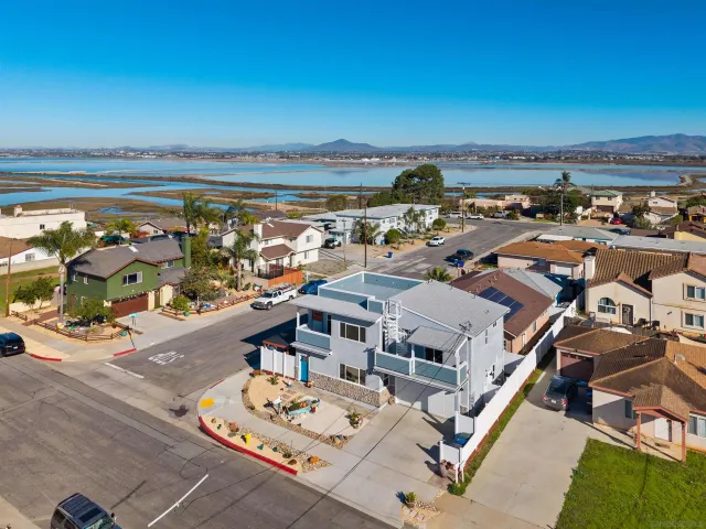 an aerial view of a house with outdoor space
