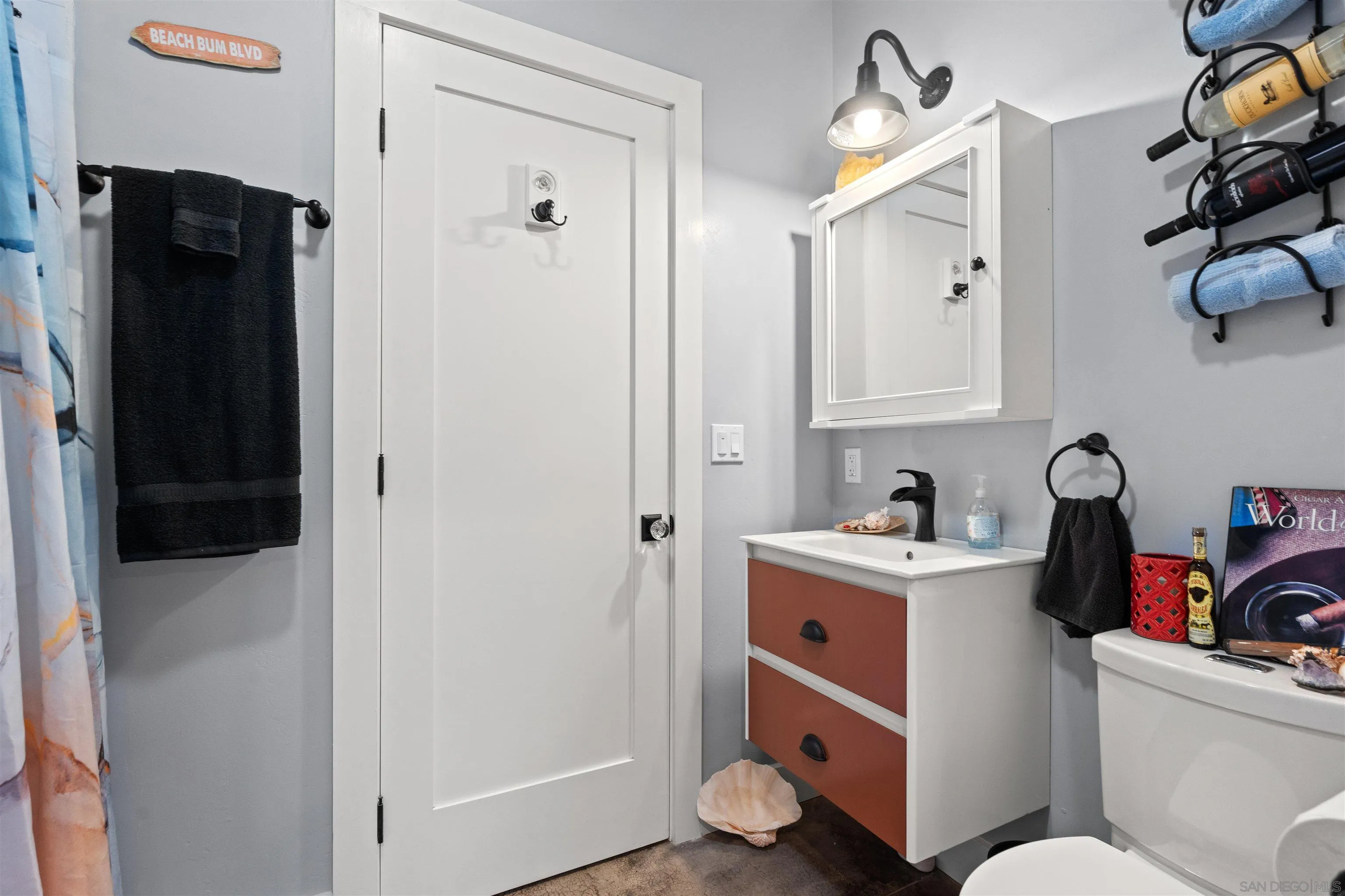 413 Delaware Street Imperial Beach, CA 91932 - Photo 9 of 37 a room with a cabinets and a window