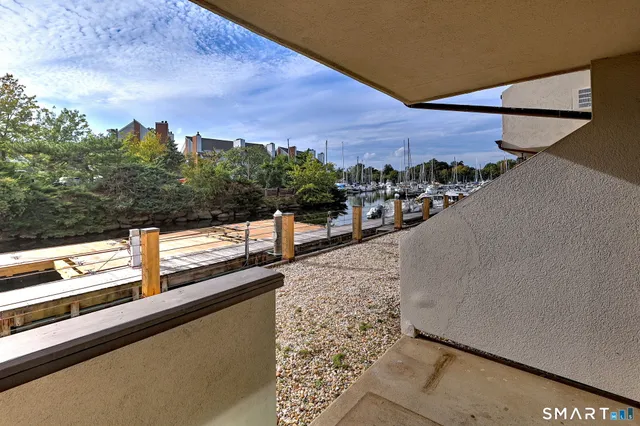 a view of a balcony with city view