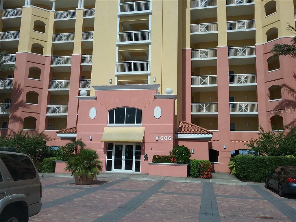 606 Riviera Dunes Way, Unit 203 Palmetto, FL 34221 - Photo 1 of 1 a front view of a multi story building